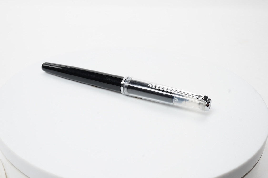 A rare Montblanc high top fountain pen in brown and black marble barrel with black cap